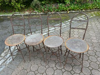 Four Old Iron Chairs