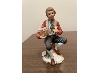 Porcelain Figure Man With Flowers