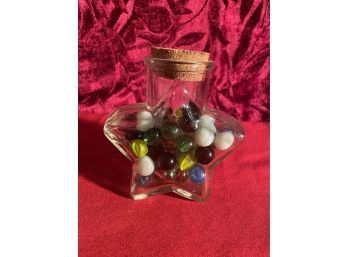 Star Shaped Glass Jar Full Of Marbles