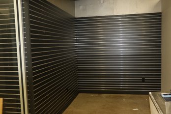 2 Walls Of Slot Board With Metal Track Aprox 6 4'x8' Boards