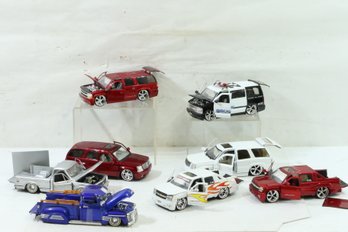 Group Of 8 1/18th Scale Low Rider Collector Trucks