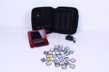 Red Nintendo DS And 29 Games Together With Storage Case