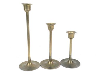 3 Graduated Brass Candlesticks