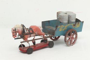 Late 1800, Early 1900 Composite Horse Pulling Tin Wagon With Cans Toy