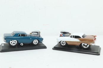 2 Muscle Machines 1:18 Scale Die Cast Cars: '63 Plymouth & '56 Oldsmobile