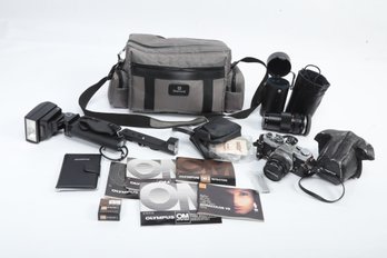 Olympus OM-2n 35mm Camera-75-100mm Lens, Auto Flash Attachment, Carrying Case & Other Accessories