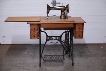 Antique SINGER Sewing Machine With Stand And Oak Cabinet