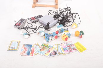 Mixed Grouping Of Smurf Action Figures, Garbage Pail Kids, & 'Mini' Entertainment System