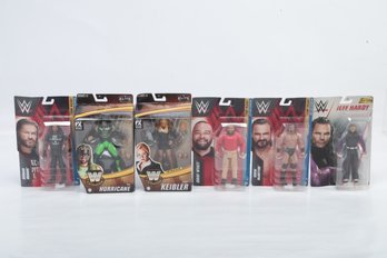 Assorted WWE Action Figures In Packages