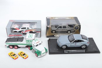 3 COLLECTABLE CARS & 1 HESS TRUCK