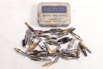 Sucrets Tin Filled With Various Types Of Pen Nibs