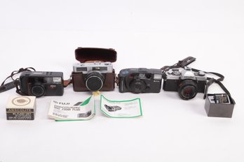 Grouping Of Vintage 35mm Cameras: Nikon, Minolta, Fugi, Ansco