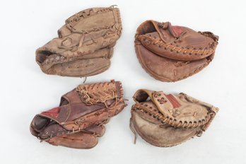 4 Vintage Baseball Gloves- Reggie Jackson - Johnny Bench (catchers Mitt)- Jim Palmer- Randy Hundley (catchers)