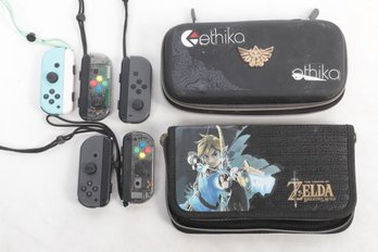 Nintendo Switch Accessory Lot: 2 Legend Of Zelda Travel Cases, 2 Pairs Of Joy Con Controllers, More