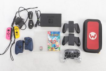 Nintendo Switch Lot: Console, Dock, Extra Joy Con Controller, Pro-Wireless Controller, Travel Case, & 2 Games