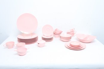 Large Grouping Of Pink Plastic Dishes