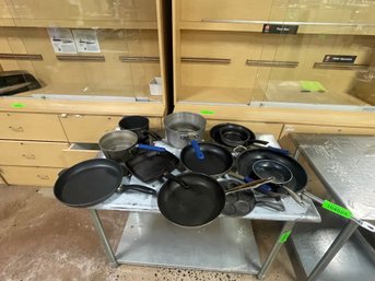 Large Group Of Used Pots And Pans