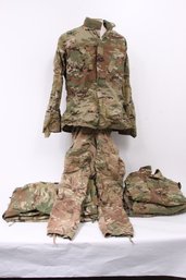 Group Of 9 US Army Military Camouflage Combat Uniforms Pants And Jackets - (5 Pants/4 Jackets) - Sizes In Imag