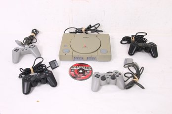 Vintage SONY Playstation 1 With 4 Controllers And Underground Jampack Game