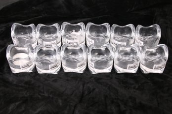GROUP OF 12 IKEA CLEAR GLASS VOTIVE CANDLE HOLDERS - MODEL VASNAS 602.590.96