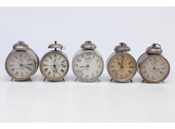 5 Early 1900's Waterbury Clock Co. Alarm Clocks Each Designated With Waterbury (CT) Advertising