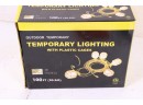 100 Ft. 12/3 SJTW 10-Light Plastic Cage Temporary Light Stringer, Yellow New