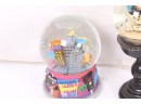 Group Of 3 Snow Globes Lord & Taylor And Skull