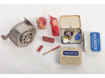Misc Lot Includes 3 Sucretes Tins, 1 With Cracker Jack Whistles, Hot Wheels Button Tabs, And Toy Game