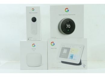 Group Of Google Nest Items Includes Thermosat, Doorbell, Nest Hub And Wifi Extender