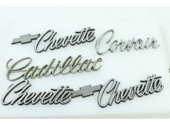 Group Of Vintage Car Emblems Includes Corvair, Cadillac & Chevette