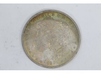 1885O Morgan Silver Dollar - BU Toned