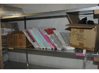 Contents Of Shelf Containing Gift Boxes And Shopping Bags