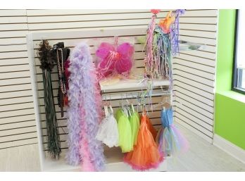 Contents Of Display Including Fairy Wings, Tutus, Boas, Wash Cloths, Etc.