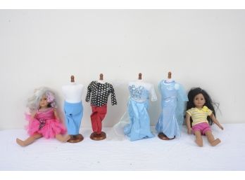 Group Containing 2 Sophia's Dolls And 4 Sophia's Doll Clothing Mannequins.