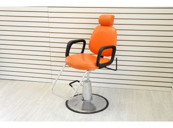 Orange Salon Chair With Head Rest.