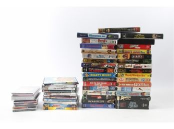 Group Of DVD Movies, VHS Movies, And Music CDs
