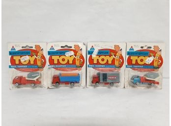 4 Piece NOS Tin Toys Die Cast Model Truck Pencil Sharpeners Sealed In Original Packaging Made In Hong Kong