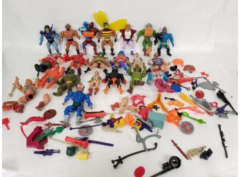 Huge Lot Of He-man Figures And Weapons