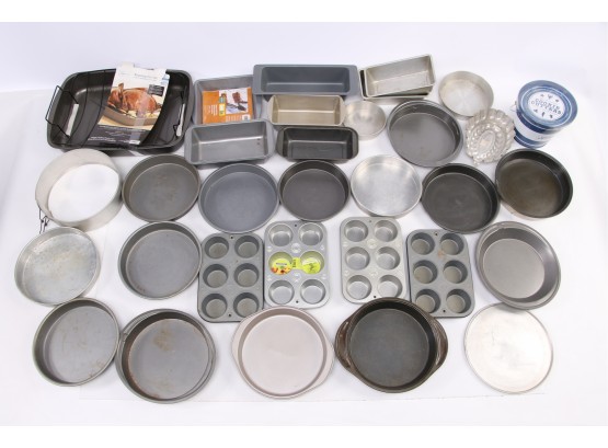 Large Group Of Cake And Cupcake Pans