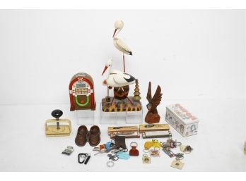 Group Of Misc Collectibles Including Harmonicas, Wood Carving Storks, Jukebox Clock/radio & More