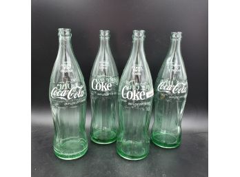 Lot Of 4  Coca Cola Bottles 26oz Size