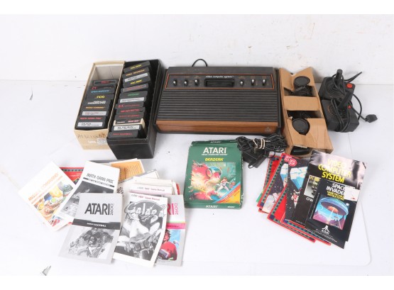 Atari 2600 With 22 Games, Instructions, Remotes Etc