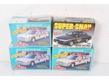 4 Vintage Model Kits 3 Revell Snaptite Chevy Caprice Police Cars & Lindberg Crown Victoria New