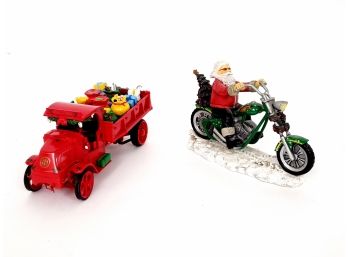 2 Christmas Collectibles Including Mack Christmas Truck 'Santa's Helper And Rebel Without A Claus Figurine