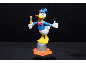 Donald Duck On Can Of Orange Paint Figurine