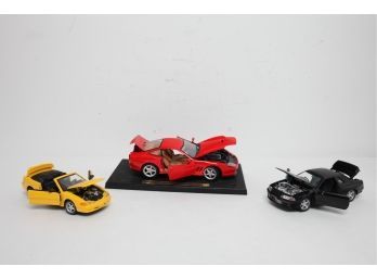 3 Die Cast Model Cars: Mustang, Nissan Skyline, & 1996 Ferrari