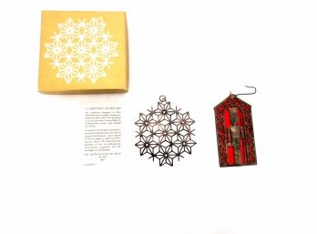 2 Christmas Ornaments Including International Silver Co. Nutcracker And Metropolitan Museum Of Art Snowflake