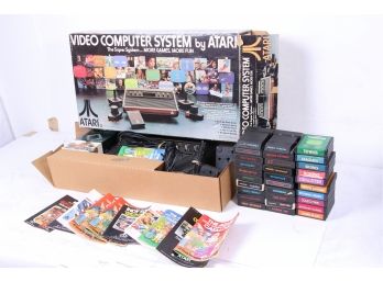 Vintage Boxed Atari 2600 With 30 Games, Instructions, And Accessories