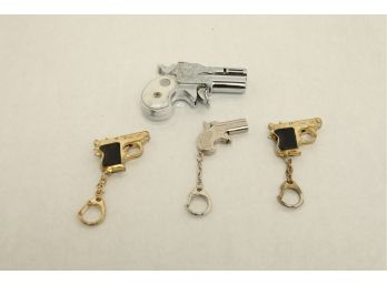 3 Vintage Keychain Cap Guns W/Gun Lighter