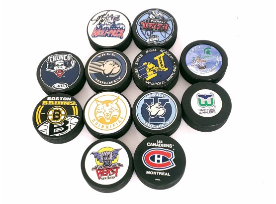 Collection Of Hockey Pucks Including Whalers,  Yale,  SIGNED Trenton Titans And Hartford Wolf Pack